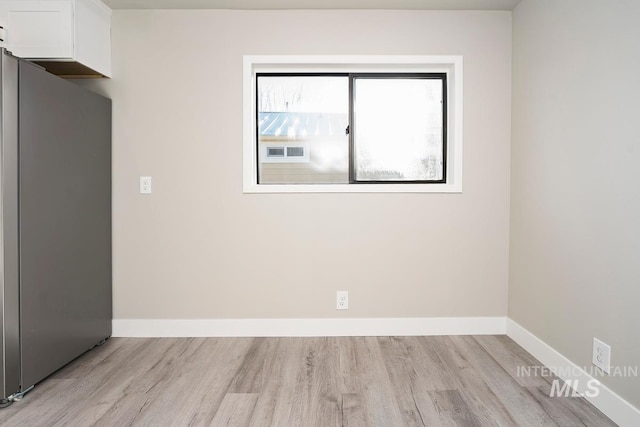 empty room featuring light hardwood / wood-style flooring