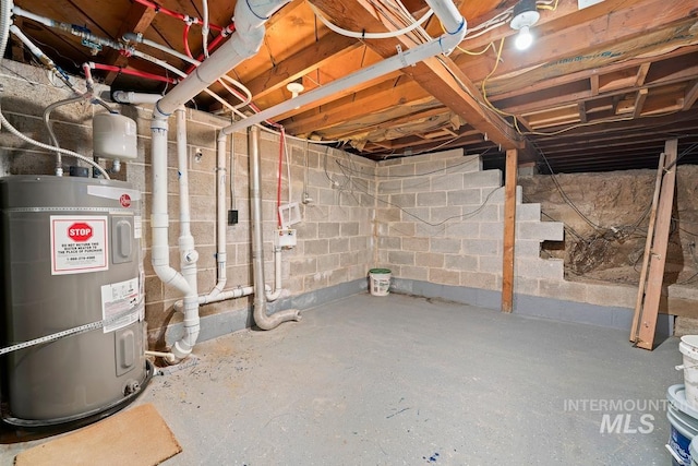 basement featuring electric water heater