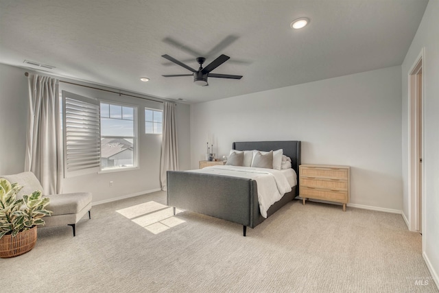 bedroom featuring light carpet, baseboards, recessed lighting, and ceiling fan