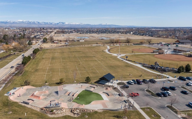 aerial overview of property's location featuring a mountainous background