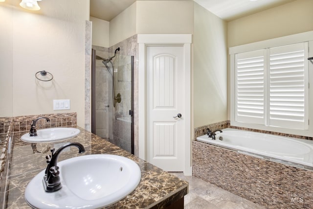 13569 Paoletti St, Caldwell, ID 83607 - bathroom with a shower stall, a bath, and double vanity