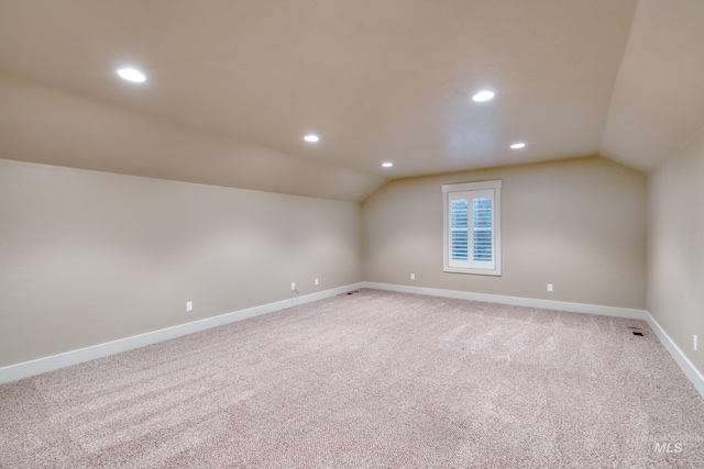13569 Paoletti St, Caldwell, ID 83607 - bonus room with lofted ceiling, light carpet, and recessed lighting