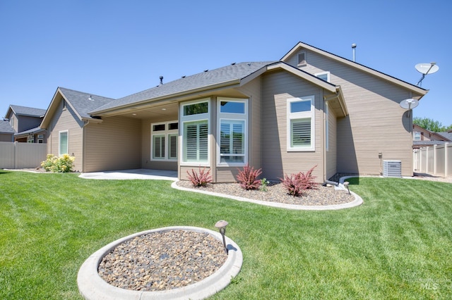 13569 Paoletti St, Caldwell, ID 83607 - back of house with a patio and roof with shingles