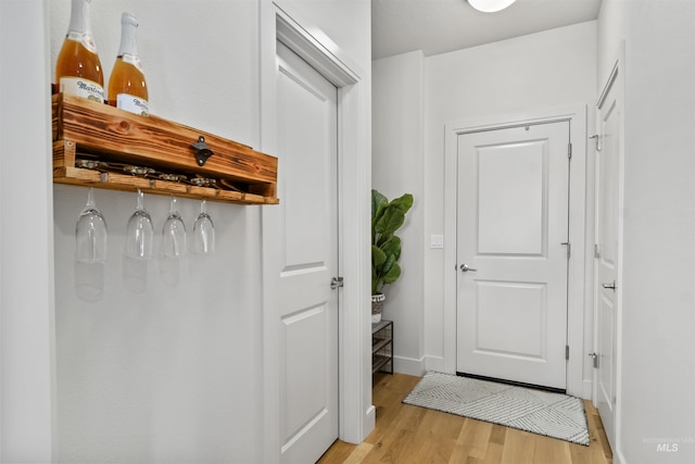 10110 Irongate Dr, Nampa, ID 83687 - entryway featuring baseboards and light wood-type flooring