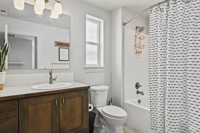 10110 Irongate Dr, Nampa, ID 83687 - bathroom with shower / tub combo, vanity, visible vents, and toilet