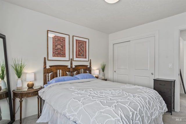 10110 Irongate Dr, Nampa, ID 83687 - bedroom featuring a closet, baseboards, and light carpet