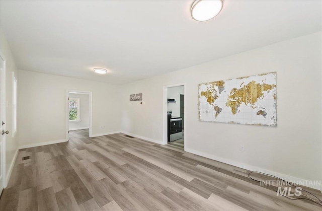 116 S Nectarine St, Nampa, ID 83686 - spare room with light wood-type flooring and baseboards