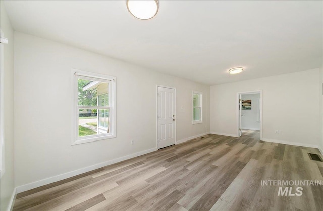 116 S Nectarine St, Nampa, ID 83686 - empty room with light wood finished floors and baseboards