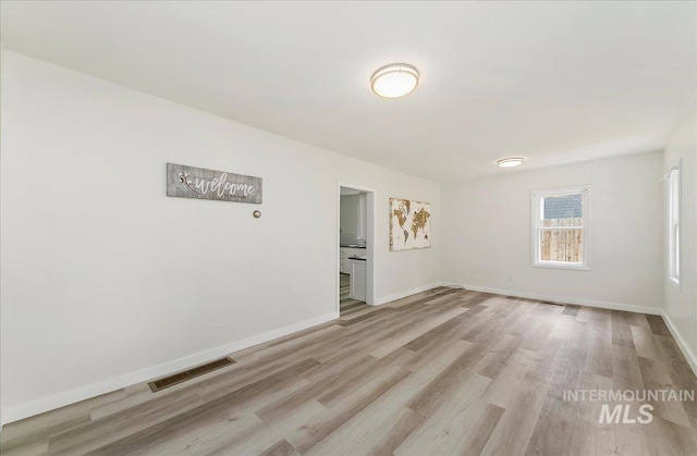116 S Nectarine St, Nampa, ID 83686 - unfurnished room with light wood-style flooring and baseboards