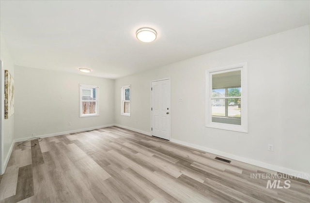 116 S Nectarine St, Nampa, ID 83686 - empty room with light wood-type flooring and baseboards