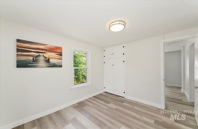 116 S Nectarine St, Nampa, ID 83686 - empty room featuring light wood-style flooring and baseboards