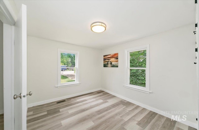 116 S Nectarine St, Nampa, ID 83686 - empty room with light wood-style floors