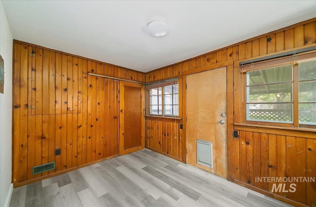 116 S Nectarine St, Nampa, ID 83686 - spare room featuring wooden walls and wood finished floors