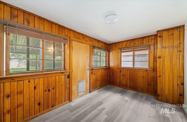 116 S Nectarine St, Nampa, ID 83686 - unfurnished room featuring light wood-style floors and wooden walls