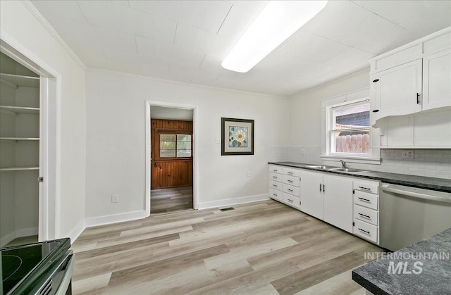116 S Nectarine St, Nampa, ID 83686 - kitchen featuring dishwasher, dark countertops, ornamental molding, white cabinetry, and decorative backsplash
