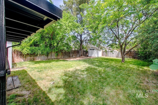 116 S Nectarine St, Nampa, ID 83686 - fenced backyard with a storage unit
