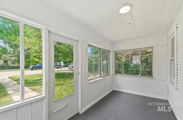116 S Nectarine St, Nampa, ID 83686 - unfurnished sunroom featuring finished concrete flooring and wooden ceiling