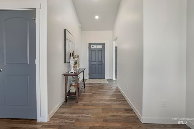 hallway featuring dark wood-type flooring