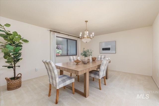 376 S Ravenswood Dr, Meridian, ID 83642 - dining room with light carpet and a chandelier