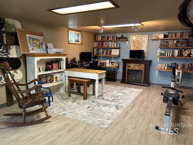 1527 13th Ave, Lewiston, ID 83501 - office area with wood finished floors and a fireplace
