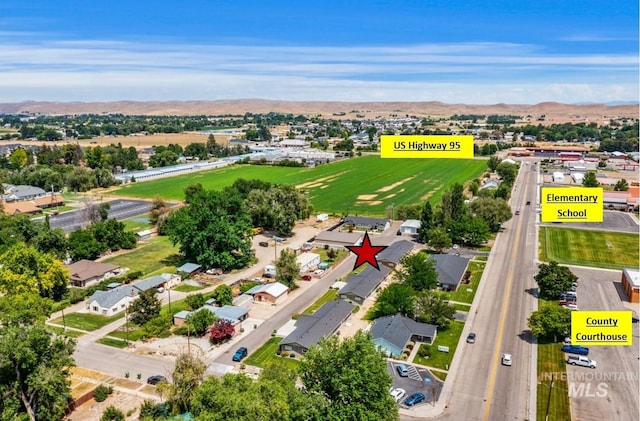 316 N 11th St, Payette, ID 83661 - aerial view of residential area featuring mountains