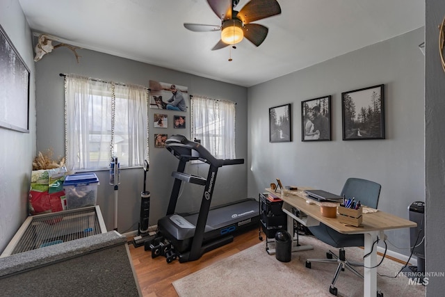 office area with ceiling fan and wood-type flooring