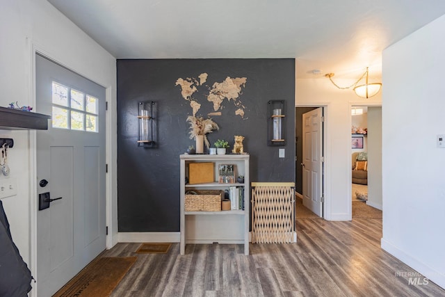 foyer entrance with hardwood / wood-style flooring