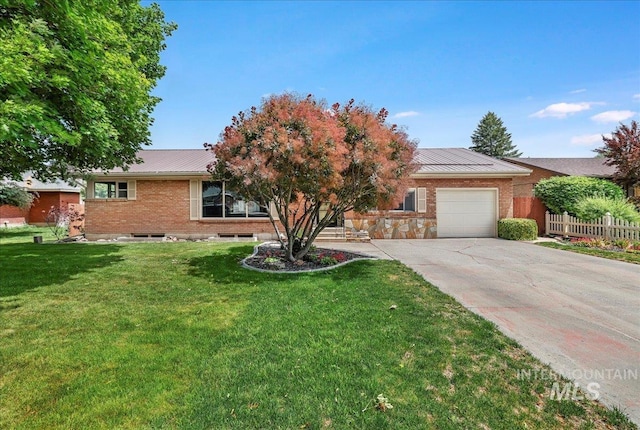 2011 Schodde, Burley, ID 83318 - view of front of property with metal roof, a garage, a standing seam roof, and concrete driveway