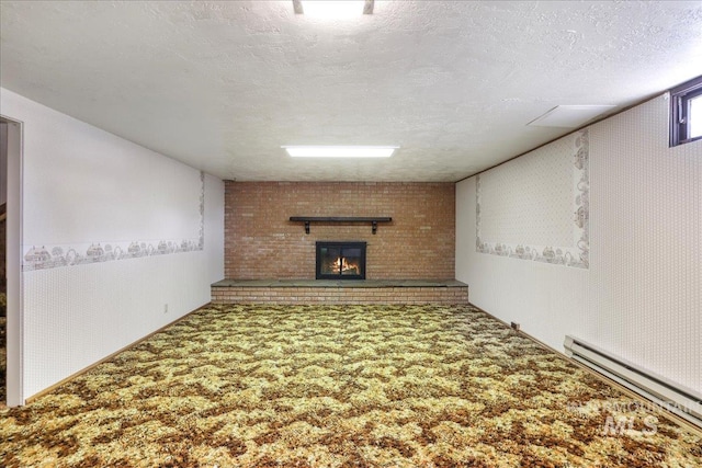 2011 Schodde, Burley, ID 83318 - finished below grade area with carpet, a fireplace, baseboard heating, and a textured ceiling