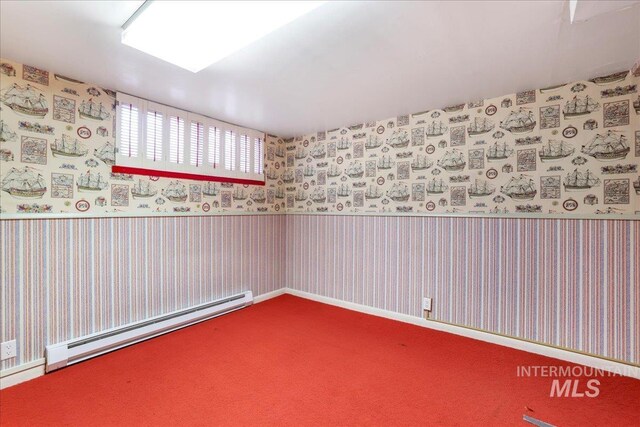 2011 Schodde, Burley, ID 83318 - carpeted spare room with wallpapered walls, a baseboard heating unit, and a wainscoted wall