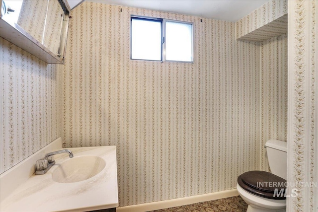 2011 Schodde, Burley, ID 83318 - half bathroom featuring toilet and vanity