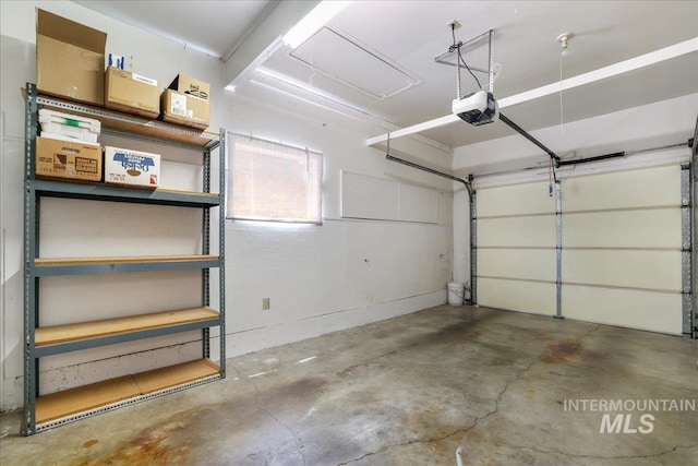 2011 Schodde, Burley, ID 83318 - garage featuring a garage door opener