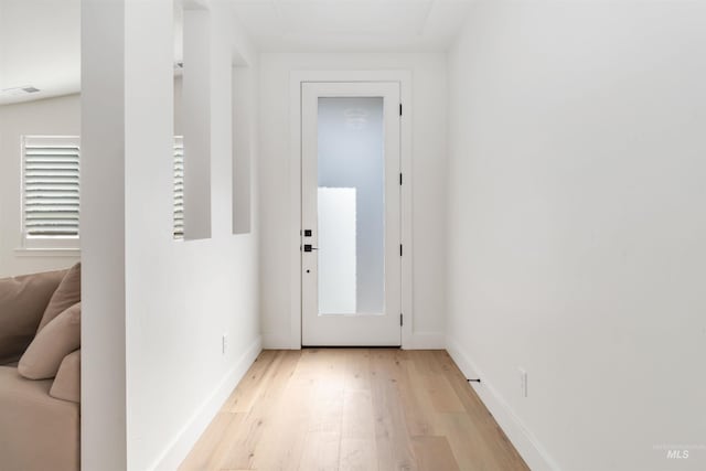 entryway with light hardwood / wood-style flooring