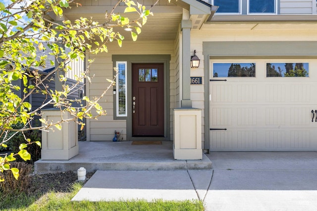 11661 W Baserri, Boise, ID 83709 - property entrance with a garage and concrete driveway