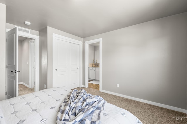 11661 W Baserri, Boise, ID 83709 - carpeted bedroom with baseboards, a closet, and connected bathroom