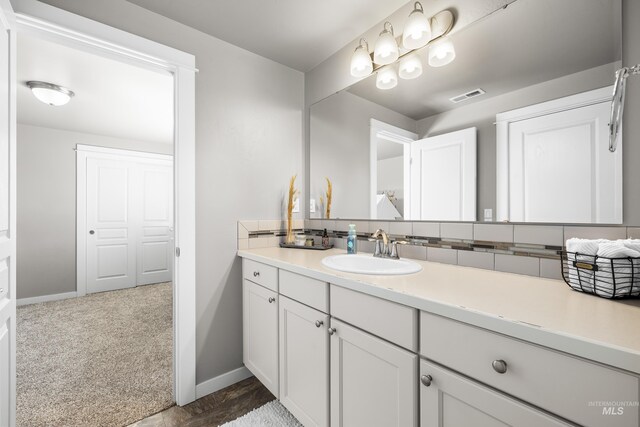 11661 W Baserri, Boise, ID 83709 - bathroom with vanity and baseboards