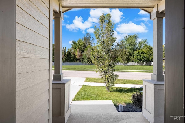 11661 W Baserri, Boise, ID 83709 - covered porch featuring a yard