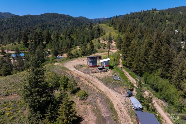 7 Ridgetop Pl, Boise, ID 83716 - drone / aerial view of a forest and a mountain backdrop