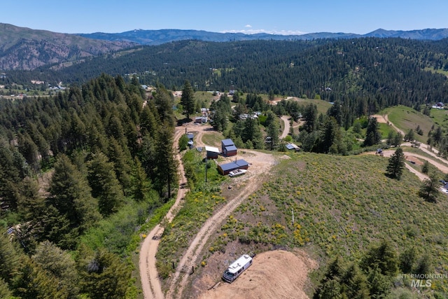 7 Ridgetop Pl, Boise, ID 83716 - drone / aerial view of a forest and a mountain backdrop