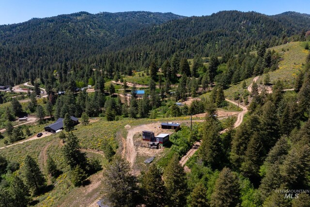 7 Ridgetop Pl, Boise, ID 83716 - aerial view of a heavily wooded area and a mountain backdrop