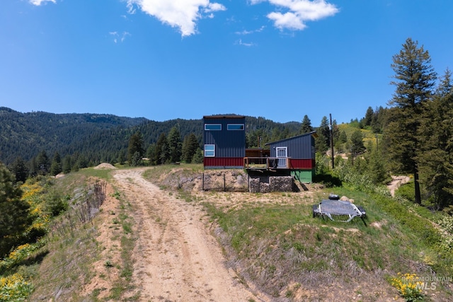 7 Ridgetop Pl, Boise, ID 83716 - view of dirt / gravel driveway featuring a wooded view