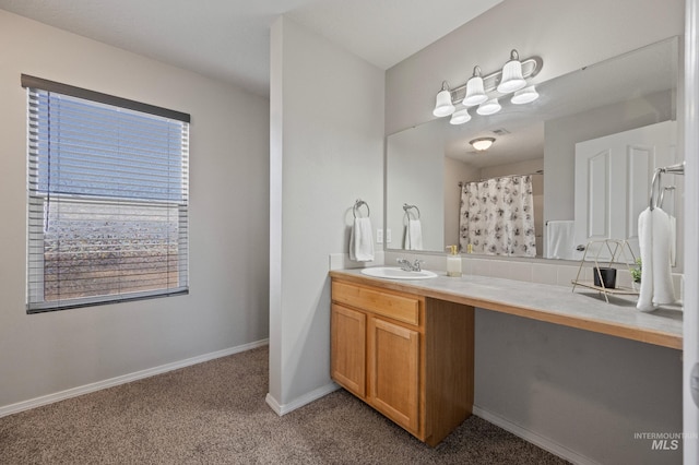 bathroom with vanity and walk in shower