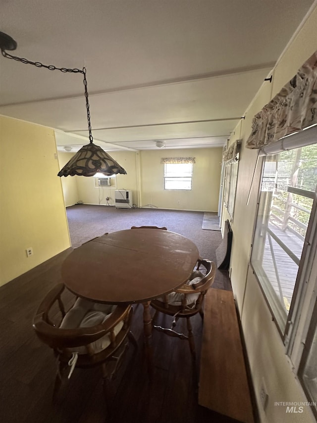 dining room featuring carpet