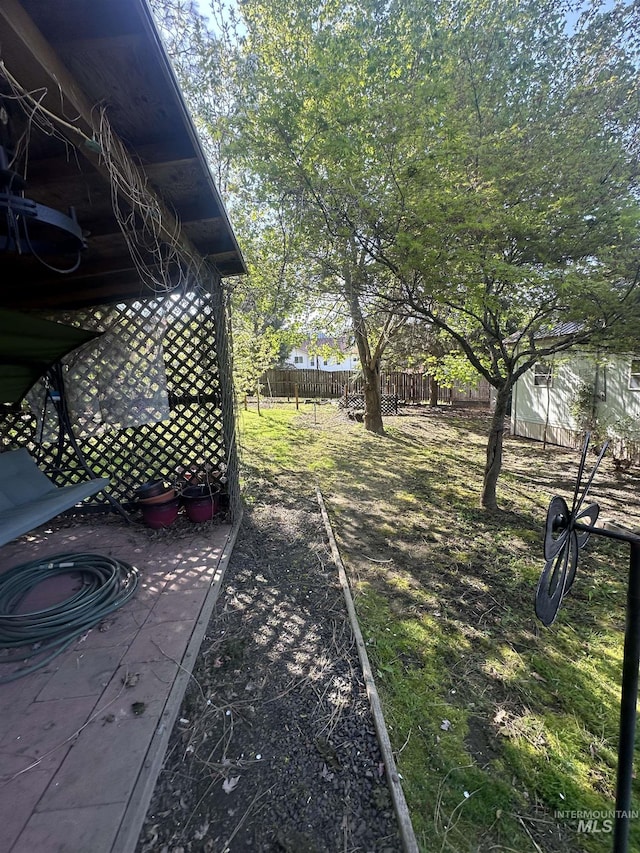 view of yard featuring fence