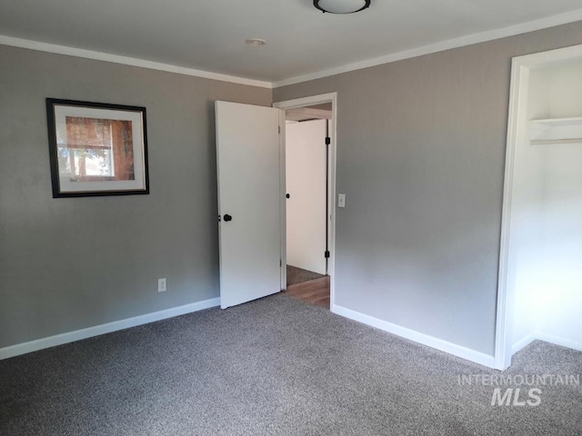39992 Waha Glen Rd, Lewiston, ID 83501 - unfurnished bedroom with baseboards, crown molding, and carpet