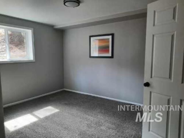 39992 Waha Glen Rd, Lewiston, ID 83501 - empty room featuring carpet floors and baseboards