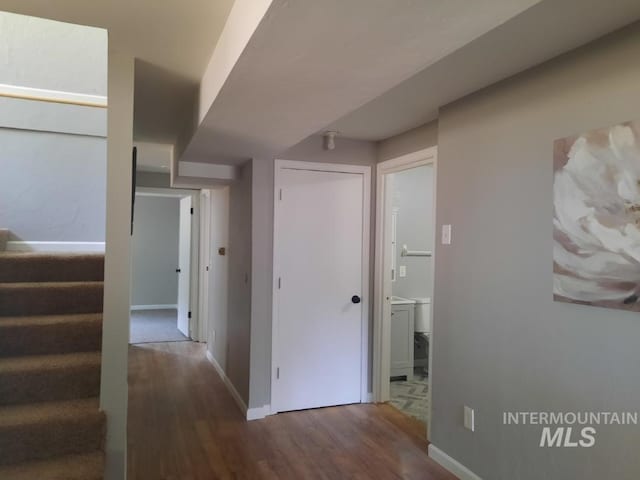 39992 Waha Glen Rd, Lewiston, ID 83501 - hall with stairs, baseboards, and wood finished floors