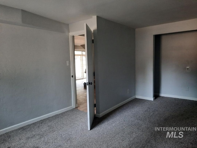 39992 Waha Glen Rd, Lewiston, ID 83501 - unfurnished bedroom featuring baseboards and carpet flooring