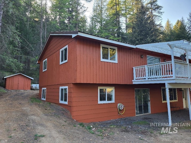 39992 Waha Glen Rd, Lewiston, ID 83501 - view of side of home with an outbuilding and a shed