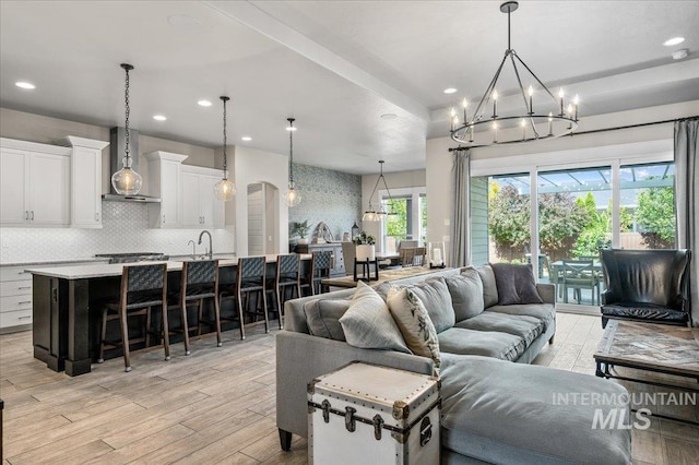 2357 N Synergy Pl, Eagle, ID 83616 - living area featuring a chandelier, light wood-style floors, and recessed lighting